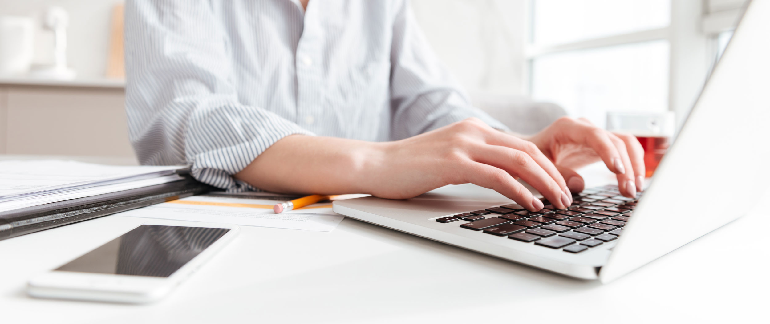 woman-typing-email-laptop-computer-while-sitting-home-selective-focus-hand